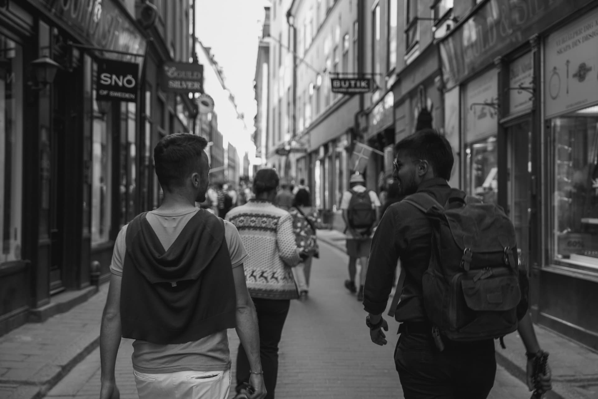 Passers-by in a Gamla Stan alley