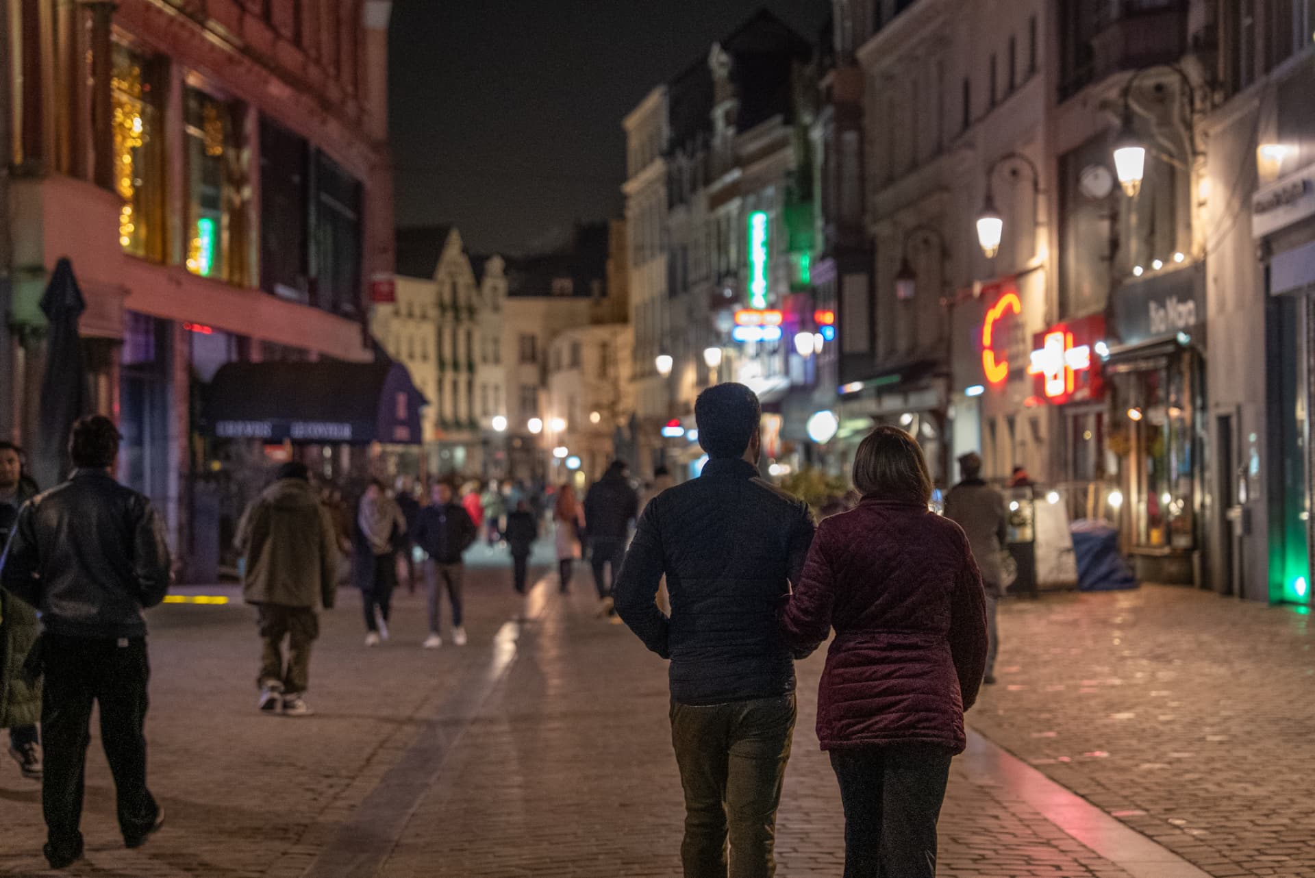 Evening walk through a lit European street